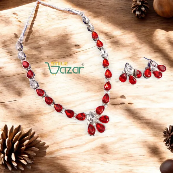 Elegant_Kundan_Necklace_Set_Adorned_With_Red_And_Clear_Kundan