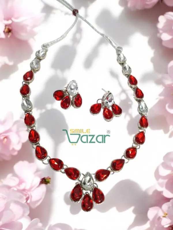 Elegant_Kundan_Necklace_Set_Adorned_With_Red_And_Clear_Kundan