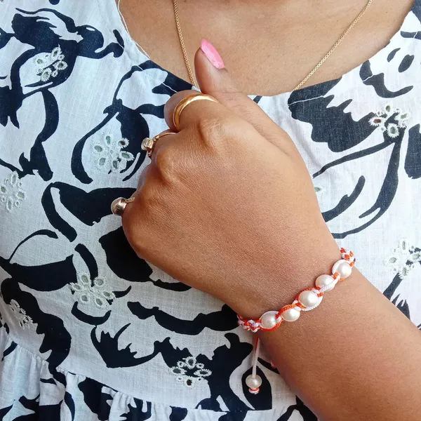 Orange_And_White_Handmade_Adjustable_Bracelet_Wristband_Friendship_Band_For_Women_Skin_Friendly