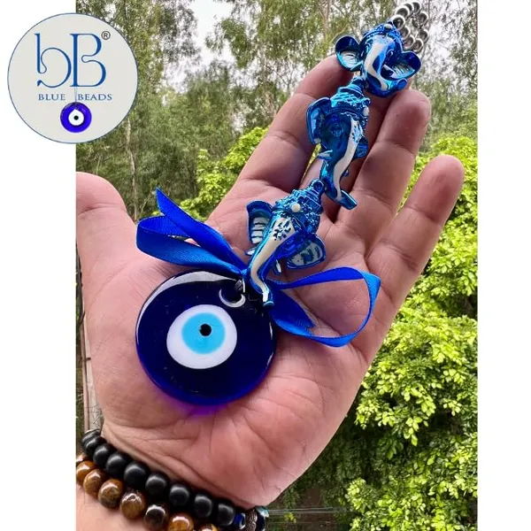 Blue_&_Silver_Lord_Ganesh_Face_With_Glass_Evil_Eye_Hanging/Door_Hanging_Nazar_Battu_For_Protection_And_Good_Luck_Perfect
