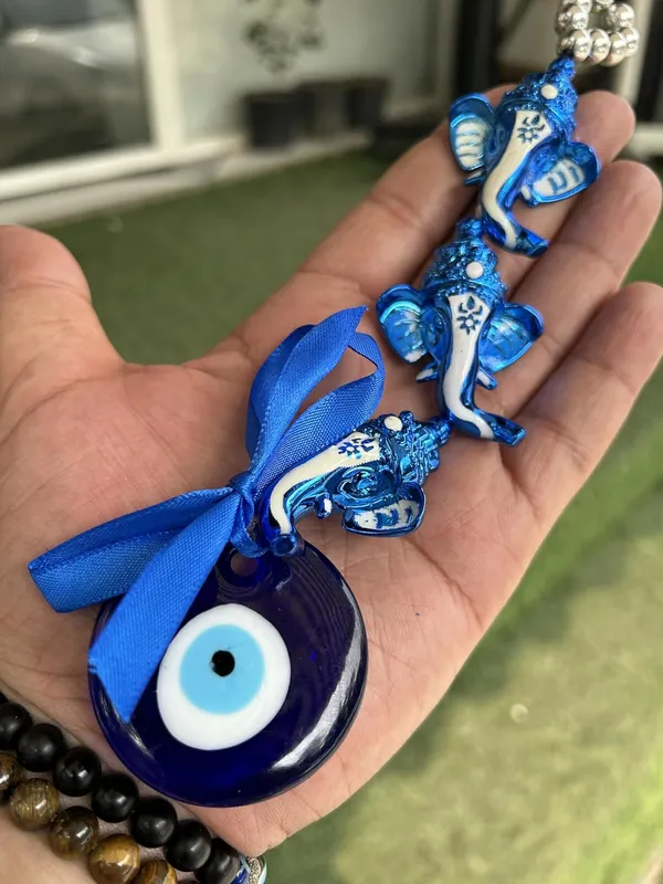 Blue_&_Silver_Lord_Ganesh_Face_With_Glass_Evil_Eye_Hanging/Door_Hanging_Nazar_Battu_For_Protection_And_Good_Luck_Perfect
