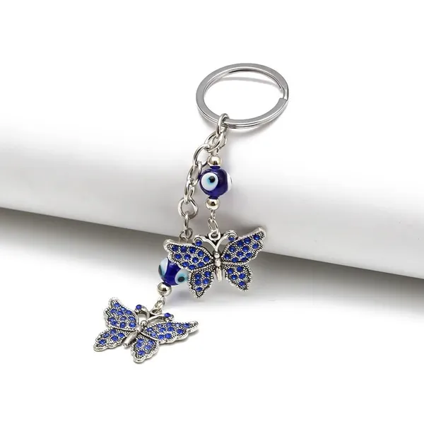 Pack_of_2_BLUE_BEADS_Combo_Offer_Blue_and_Silver_Evil_Eye_Peacock_with_Blue_Round_Design_Keychain_For_Bike/Car_Gifting_With_Key_Ring_Anti-Rust