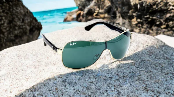 SwamiRaj_EyeWorld_One_piece_Sunglass_Golden_with_Black,_Polycarbonate_UV_Protected_Lens,_Unisex