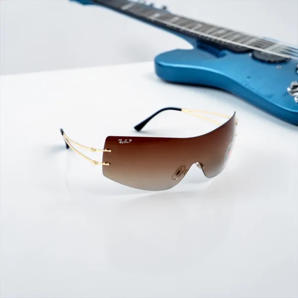 SwamiRaj_EyeWorld__Rimless_One_Piece__Premium_Branded_Sunglasses_with_Stylish_Rich_Looking_UV_Protected_Polarized_Lens__for_Men_&_Women__(8058_Golden_with_Brown_)