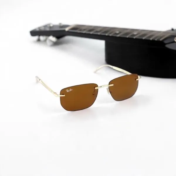 SwamiRaj_EyeWorld_Latest_&_Most_Trending_Rimless_Sunglasses_For_Men_&_Women_With_Very_Light_Weight_Titanium_Frame_&_UV_Protected_Polycarbonate_Lens_(RB_25069_Golden_with_Brown)