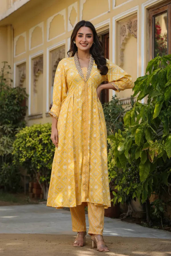 Yellow_Muthalaa_Flared_Rayon_Suit_Set_For_Women
