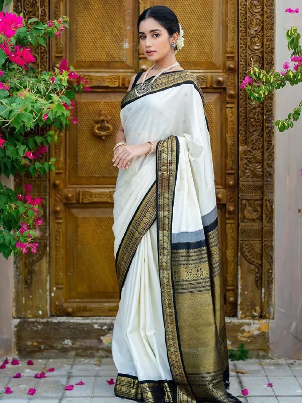 Elegance_Redefined_Roop_Fashion's_Luxurious_White_Banarasi_Soft_Silk_Saree_with_Intricate_Brocade_and_Gold_Zari_Work_for_Women