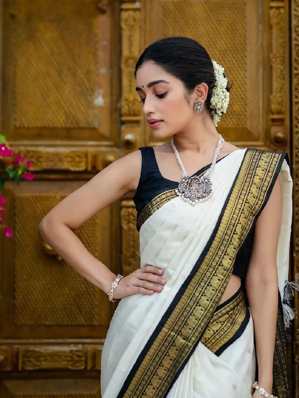 Elegance_Redefined_Roop_Fashion's_Luxurious_White_Banarasi_Soft_Silk_Saree_with_Intricate_Brocade_and_Gold_Zari_Work_for_Women