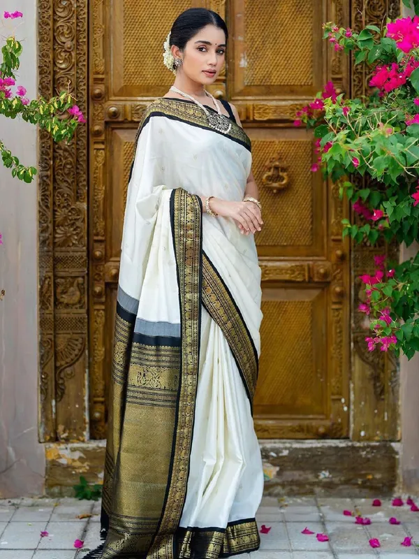 Elegance_Redefined_Roop_Fashion's_Luxurious_White_Banarasi_Soft_Silk_Saree_with_Intricate_Brocade_and_Gold_Zari_Work_for_Women