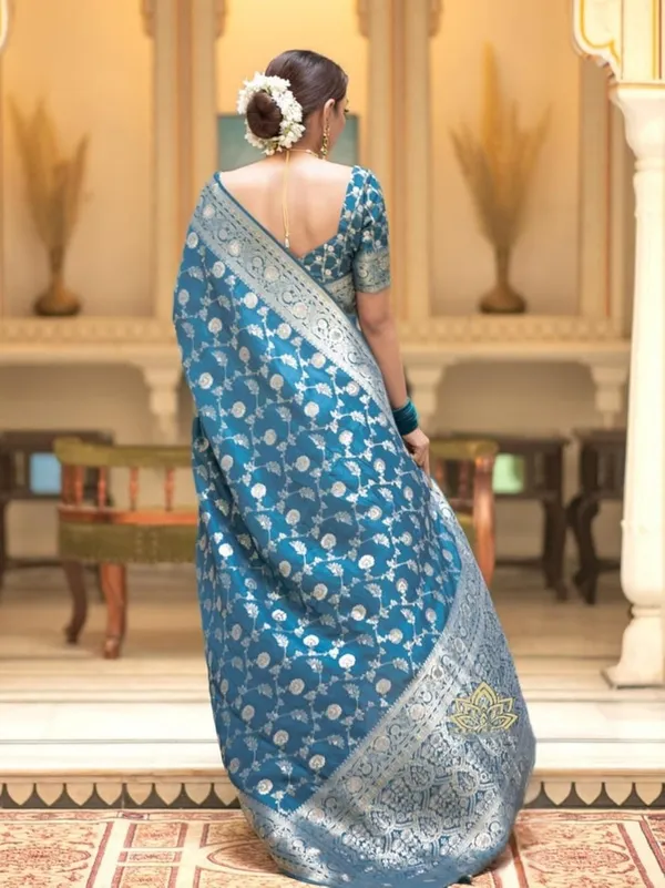 Teal_Blue_Banarasi_Saree_New_Collection_�_Latest_Design_Soft_Lichi_Silk_Partywear_Sadi_With_Heavy_Brocade_Blouse,_Rich_Pallu,_and_Zari_Weaving_|_Trending_Wedding_Saree_for_Women