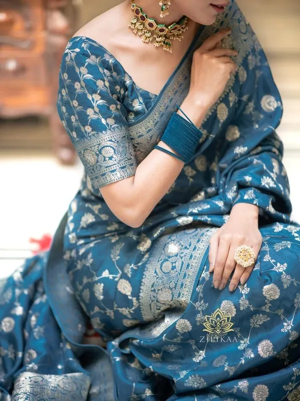 Teal_Blue_Banarasi_Saree_New_Collection_�_Latest_Design_Soft_Lichi_Silk_Partywear_Sadi_With_Heavy_Brocade_Blouse,_Rich_Pallu,_and_Zari_Weaving_|_Trending_Wedding_Saree_for_Women