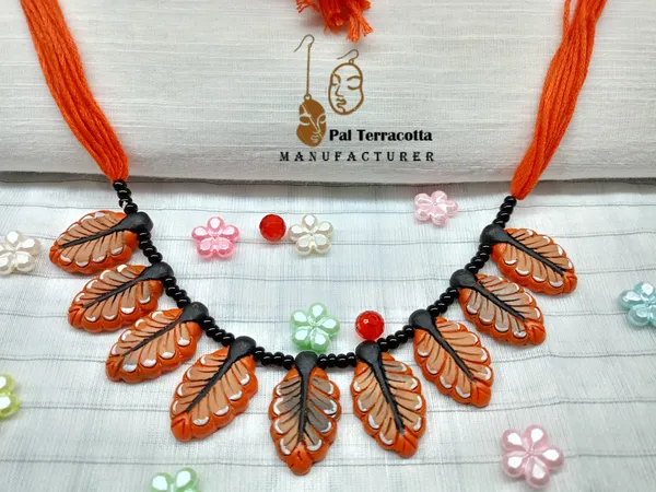 Orange_Leaf_Wonders_Handcrafted_Jewellery_Set_With_Intricate_Patterns