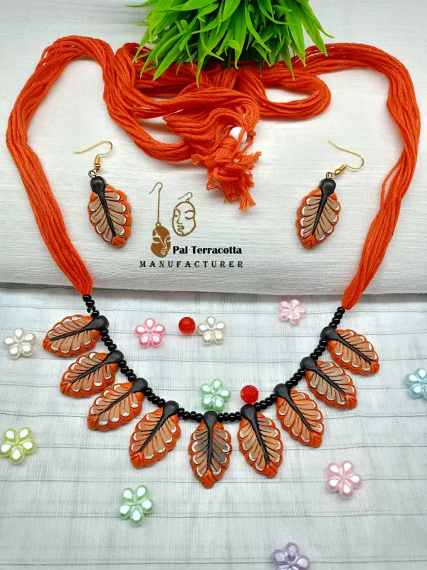 Orange_Leaf_Wonders_Handcrafted_Jewellery_Set_With_Intricate_Patterns