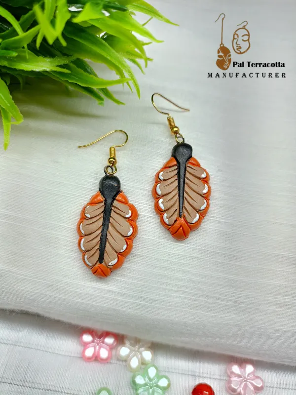Orange_Leaf_Wonders_Handcrafted_Jewellery_Set_With_Intricate_Patterns