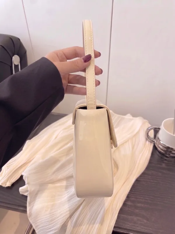LIKE_STYLE_Patent_PU_Sling_Bag_with_Metal_Clasp