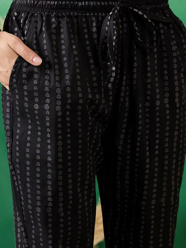 Black_Discharge_print_with_Round_neck_embroidered_cotton_kurta_sets