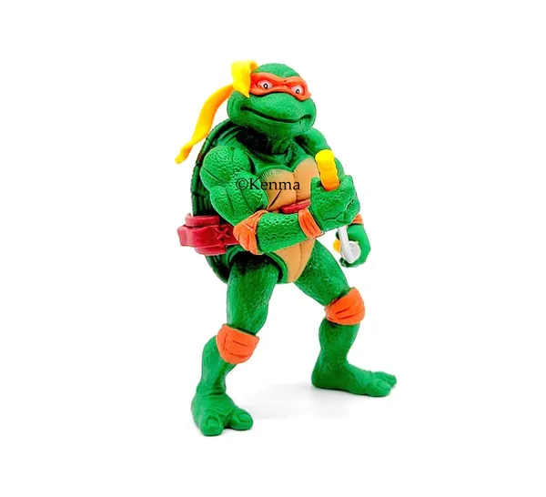 Teenage_Mutant_Ninja_Turtles_Adjustable_With_Accessories_Michelangelo_Action_Figurine_(12_Cm)