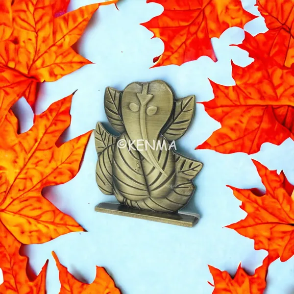 Leaf_Ganesh_Ganpati_Bappa_Murti_Brass_Colour_Idol_Figure_For_Desk_Table_&_Car_Dashboard_Metal_Figure_Accessory_Figurine_Model_1_(6.5_Cm)