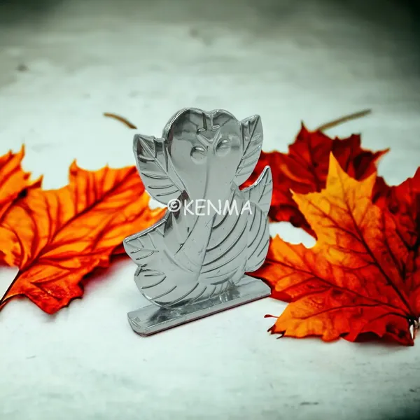 Leaf_Ganesh_Ganpati_Bappa_Murti_Silver_Idol_Figure_For_Desk_Table_&_Car_Dashboard_Metal_Figure_Accessory_Figurine_Model_5_(6.5_Cm)