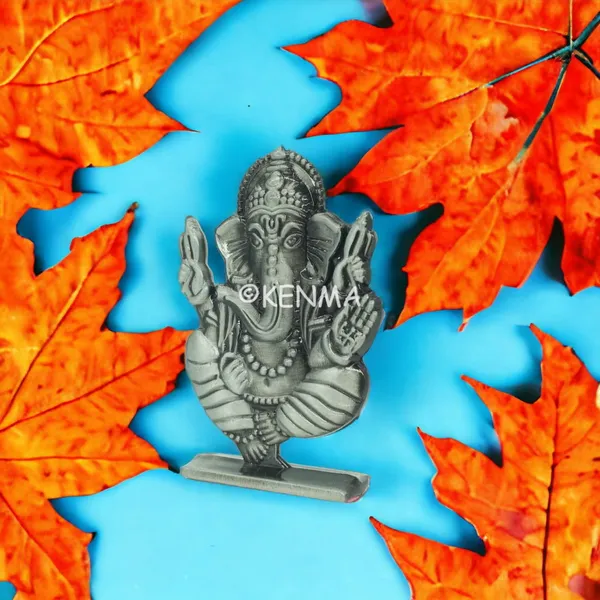 Lord_Ganesh_Ganpati_Bappa_Murti_Model_2_Idol_Metalic_Colour_Figure_For_Desk_Table_&_Car_Dashboard_Metal_Figure_Accessory_Figurine_(6.5_Cm)