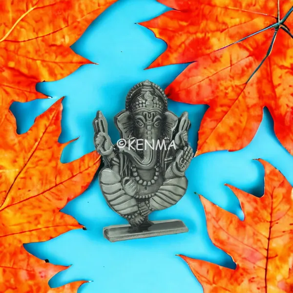 Lord_Ganesh_Ganpati_Bappa_Murti_Model_2_Idol_Metalic_Colour_Figure_For_Desk_Table_&_Car_Dashboard_Metal_Figure_Accessory_Figurine_(6.5_Cm)