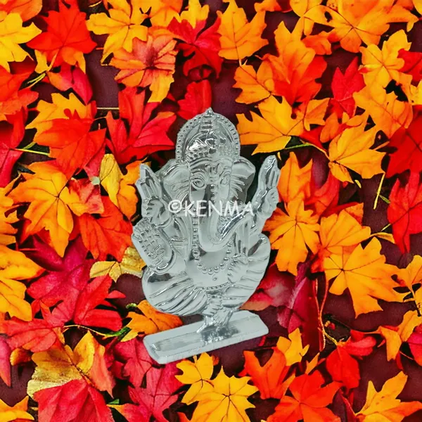 Lord_Ganesh_Ganpati_Bappa_Murti_Idol_Silver_Colour_Figure_For_Desk_Table_&_Car_Dashboard_Metal_Figure_|_Accessory_Figurine_Model_1_(6.5_Cm)
