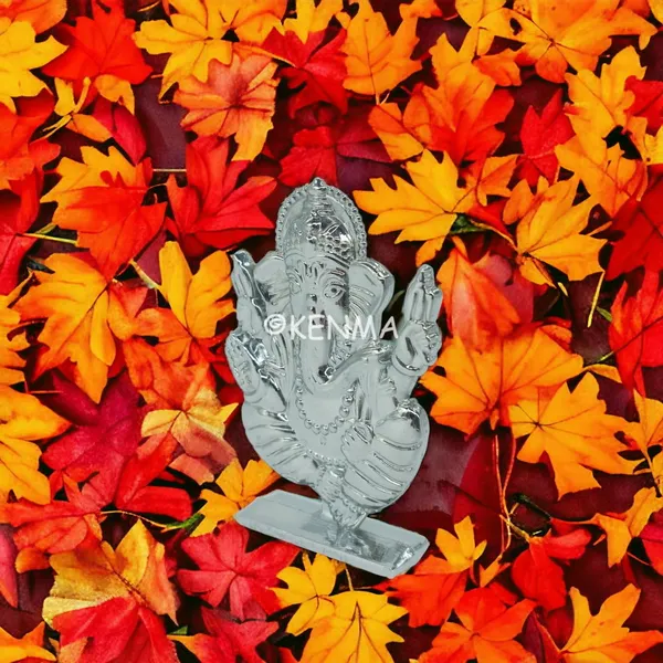Lord_Ganesh_Ganpati_Bappa_Murti_Idol_Silver_Colour_Figure_For_Desk_Table_&_Car_Dashboard_Metal_Figure_|_Accessory_Figurine_Model_1_(6.5_Cm)