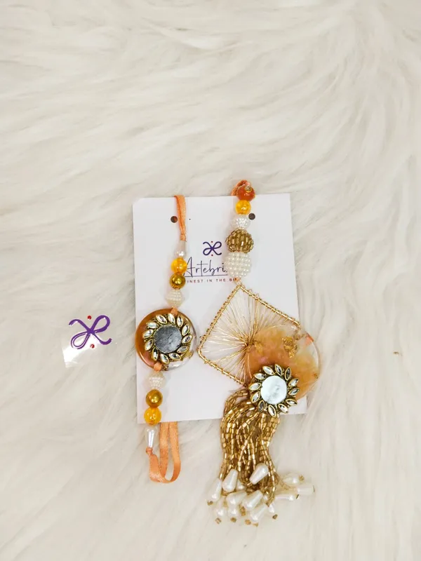 Peach_Mirror_Elegance_Pair_Rakhi_