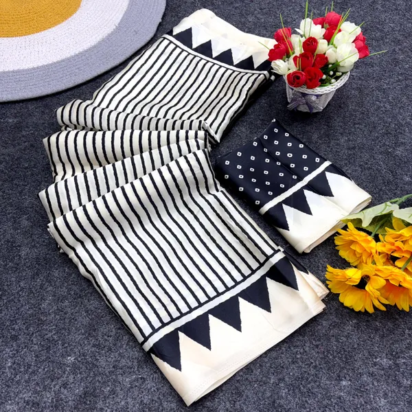 BLACK_AND_WHITE_LINING_SAREE_WITH_FLOWER_BINDI_PALLU