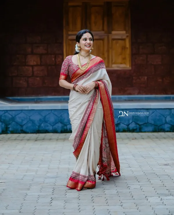 Traditional_Cream_&_Maroon_Saree_with_Golden_Weaving_–_Minimal_Border_Elegance