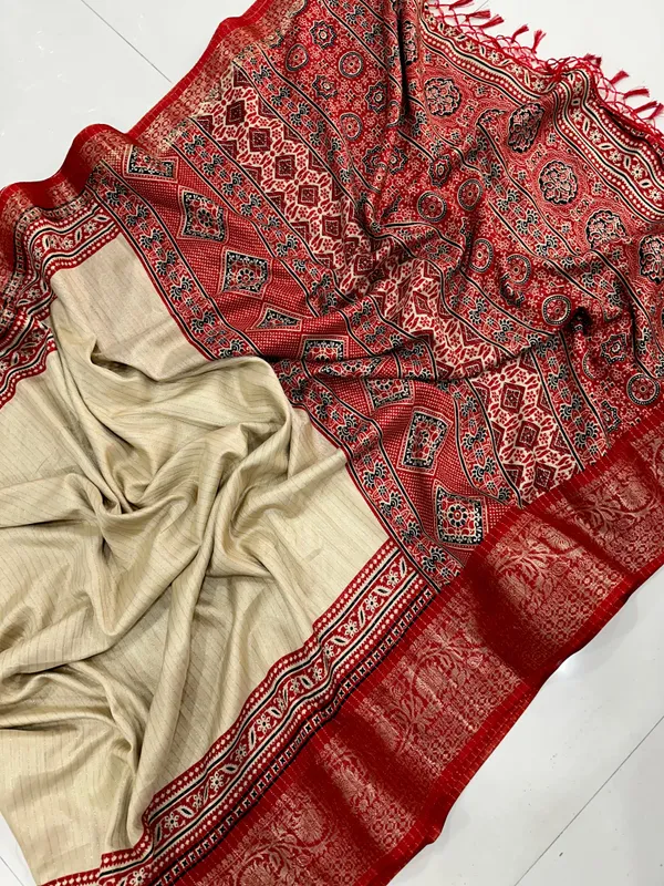 TRADITIONAL_CREAM_AND_RED_COLOR_WITH_BEAUTIFULL_GOLDEN_WEVING_SAREE_WITH_LESS_BORDER