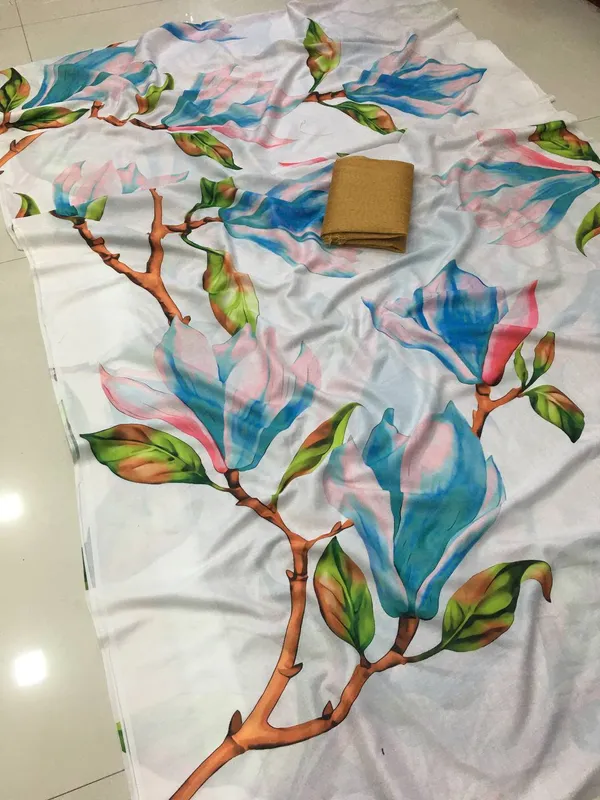Attractive_White_Color_Kalamkari_Linen_Saree_With_Blouse_Piece
