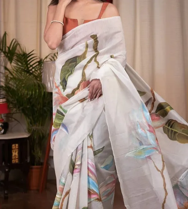 Attractive_White_Color_Kalamkari_Linen_Saree_With_Blouse_Piece
