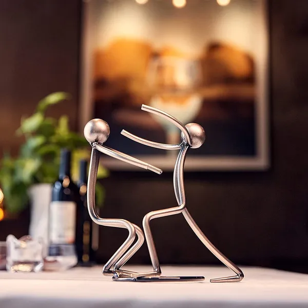Silver_Tabletop_Wine_Rack_abletop_Metallic_Silver_Freestanding_Countertop_Figurine_Wine_Bottle_Holder,_Unique_Wine_Gifts_And_Accessories_For_Wine_Lovers_(Couple_1)____17L_x_9W_x_17H_Centimeters