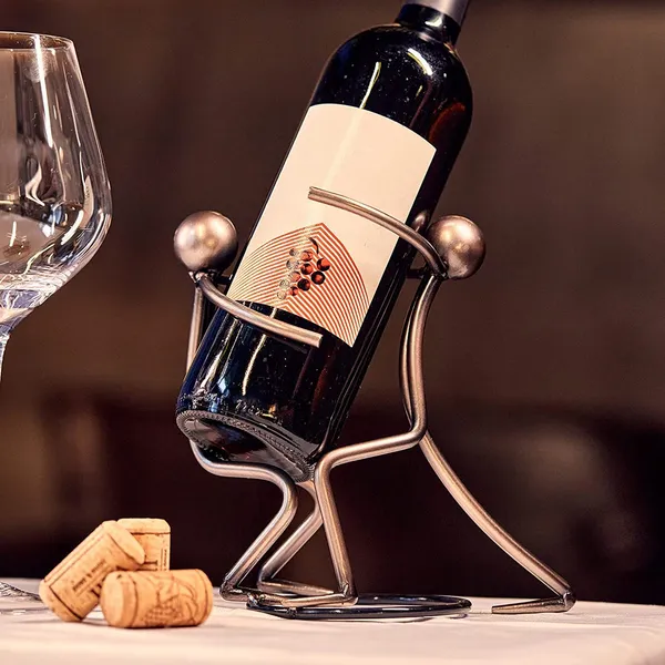 Silver_Tabletop_Wine_Rack_abletop_Metallic_Silver_Freestanding_Countertop_Figurine_Wine_Bottle_Holder,_Unique_Wine_Gifts_And_Accessories_For_Wine_Lovers_(Couple_1)____17L_x_9W_x_17H_Centimeters
