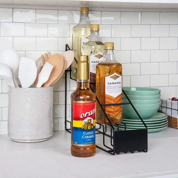 Black_Decorative_4_Wine_Bottle_Holder_Stand_Can_Fix_On_Wall_Or_Can_Put_On_Table,_Clear_Syrup_Bottle_Holder,_Wire_4_Compartment_Bottle_Organizer,_Storage_For_Syrup,_Wine_33L_x_11W_x_13H_Centimeters