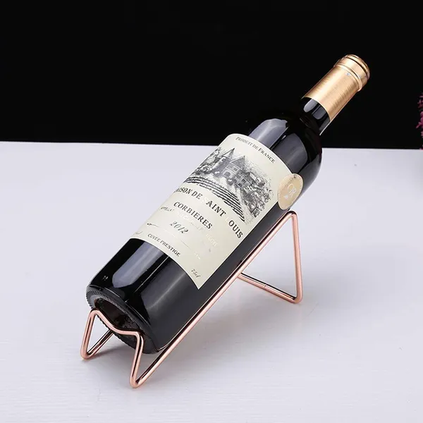 Rose_Gold_Metal_Wine_Rack_Freestanding_Tabletop_Wine_Bottle_Holder_Geometric_Design_For_Table_Top_Wine_Bottle_Storage_Rack,_Perfect_Wine_Holder_(4_Pcs)____19L_x_7W_x_8H_Centimeters