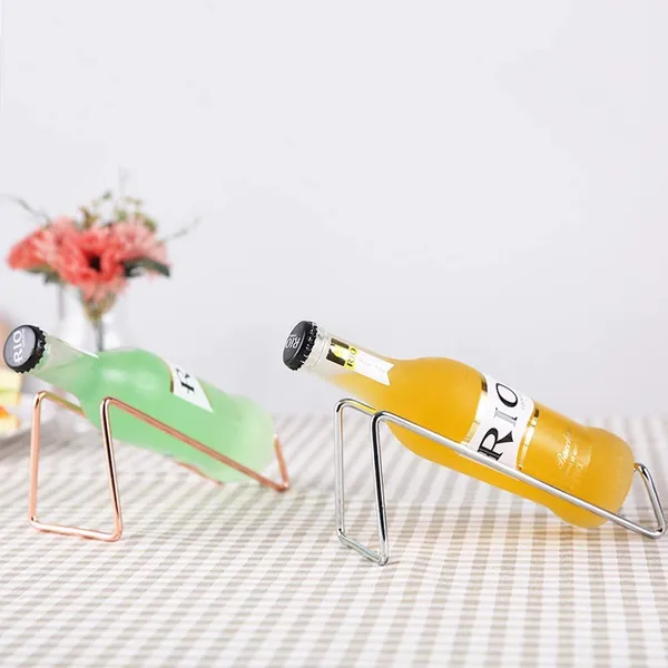 Rose_Gold_Metal_Wine_Rack_Freestanding_Tabletop_Wine_Bottle_Holder_Geometric_Design_For_Table_Top_Wine_Bottle_Storage_Rack,_Perfect_Wine_Holder_(4_Pcs)____19L_x_7W_x_8H_Centimeters