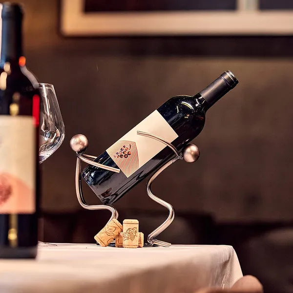 Silver_Tabletop_Wine_Rack__abletop_Metallic_Silver_Freestanding_Countertop_Figurine_Wine_Bottle_Holder,_Unique_Wine_Gifts_And_Accessories_For_Wine_Lovers_(Couple_2)____17L_x_9W_x_17H_Centimeters