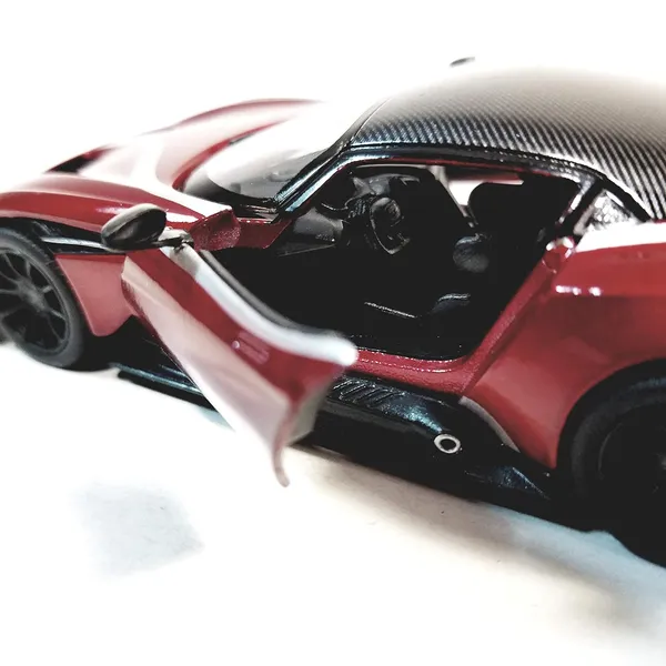 Kinsmart_Maroon_Aston_Martin_Vulcan_Metal_1:38_Diecast_Model_Car_For