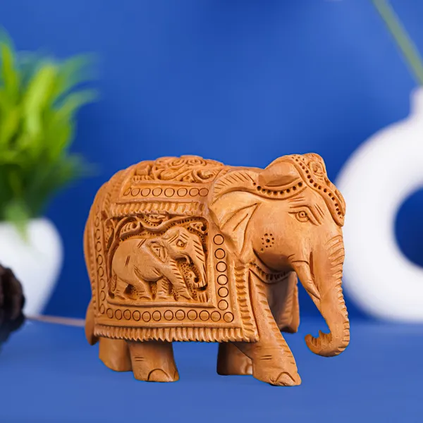 Vasu_Creation_Hand_Carved_Wooden_Elephant_Statue,_Traditional_Indian_Design,_Decorative_Figurine_with_Intricate_Details_4inch