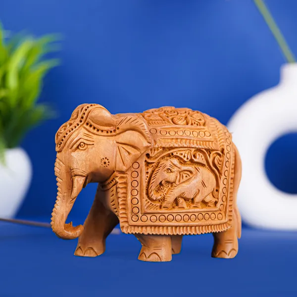 Vasu_Creation_Hand_Carved_Wooden_Elephant_Statue,_Traditional_Indian_Design,_Decorative_Figurine_with_Intricate_Details_4inch