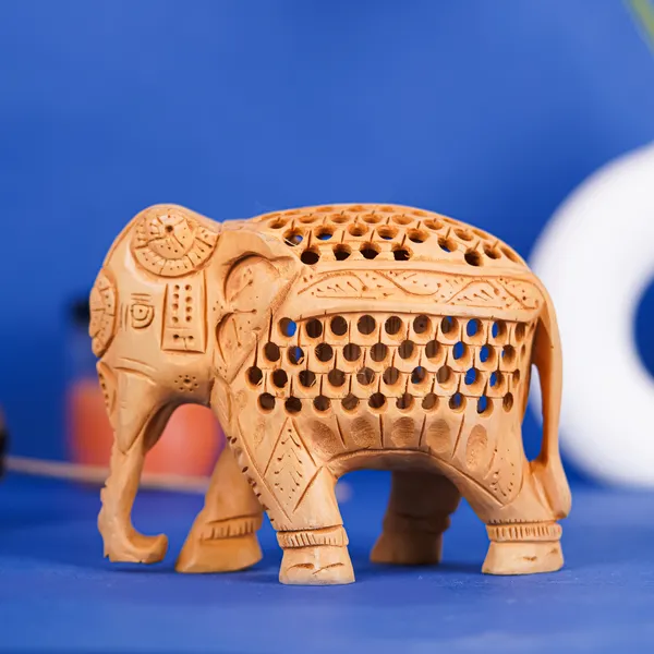Vasu_Creation_Handcrafted_Wooden_Elephant_Figurine,_Traditional_Indian_Design,_Jali_Work,_Natural_Wood_Carving
