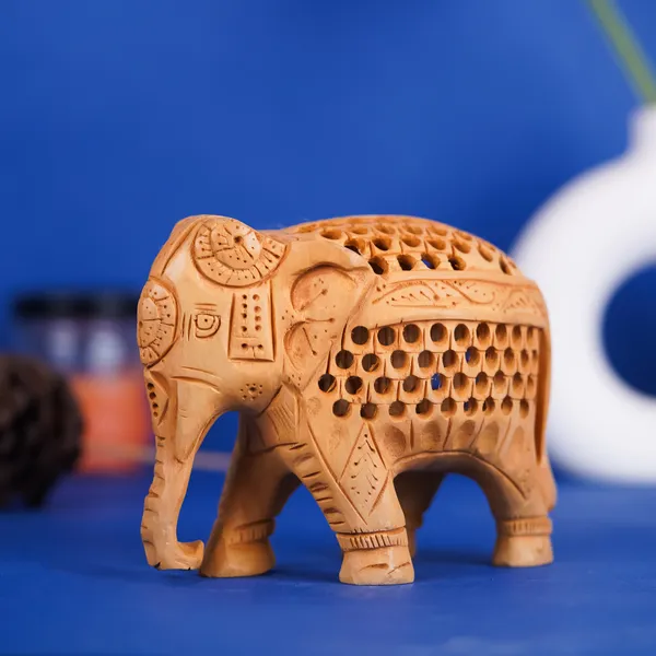 Vasu_Creation_Handcrafted_Wooden_Elephant_Figurine,_Traditional_Indian_Design,_Jali_Work,_Natural_Wood_Carving
