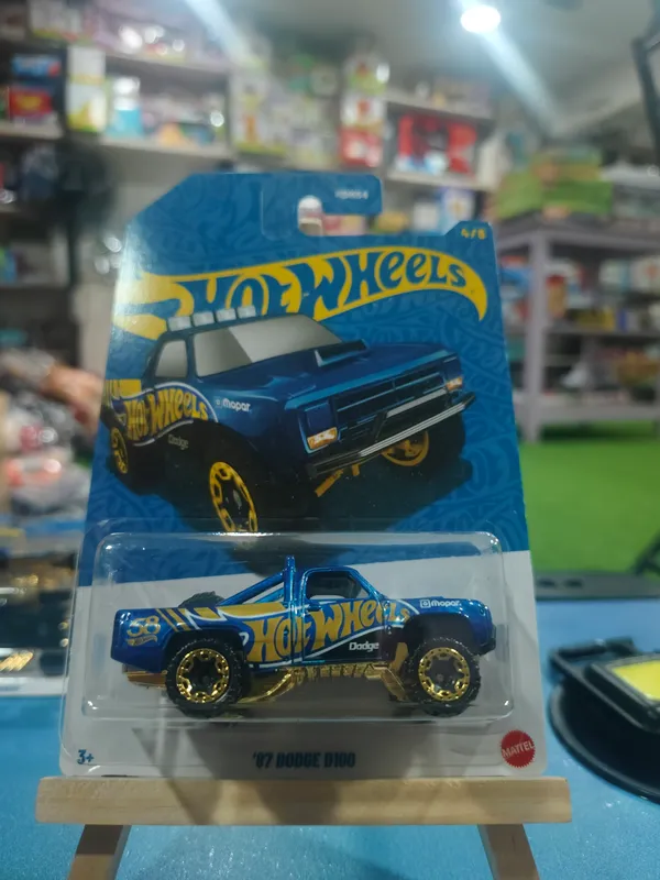 Hot_Wheels_1:64_Scale_87_DODGE_D100_58th_Anniversary_JKX84_BLUE_AND_GOLD_4/6