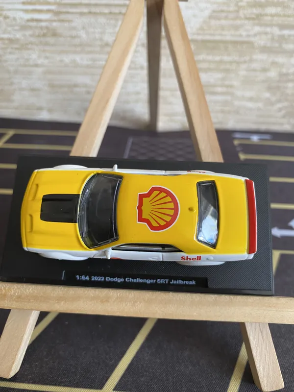 CCA_1_:_64_SCALE_2022_DODGE_CHALLENGER_SRT_JAILBREAK_ACRYLIC_DISPLAY_BOX_YELLOW