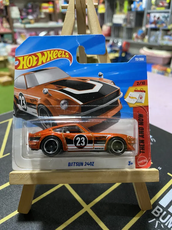 Hot_Wheels_1:64_Scale_DATSUN_240Z_THEN_AND_NOW_2/10_ORANGE_72/250_(USA_IMPORTED)