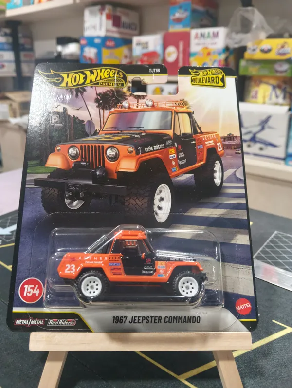 Hotwheels_Premium_1:64_Scale_BOULEVARD_2026_1967_JEEPSTER_COMMANDO_JHW29_ORANGE_154