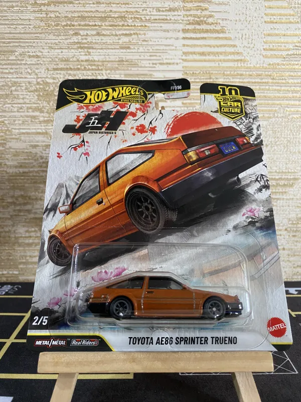 Hotwheels_Premium_1:64_Scale_CAR_CULTURE_2026_TOYOTA_AE86_SPRINTER_TRUENO_JAPAN_HISTORICS_5_2/5_JKF10_ORANGE_(IMPORTED)