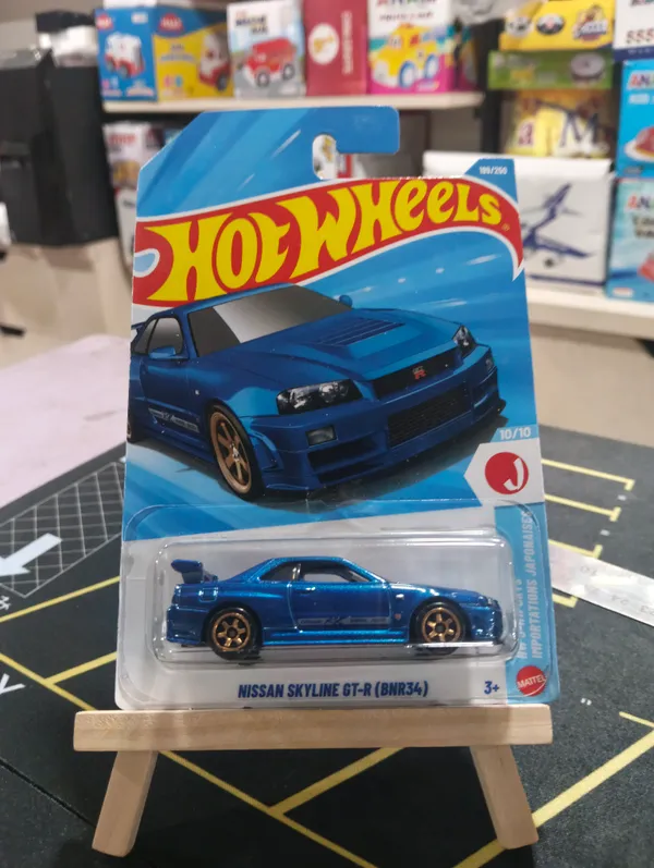 Hot_Wheels_1:64_Scale_NISSAN_SKYLINE_GT-R_(BNR34)_HW_J_IMPORTS_10/10_BLUE_199/250